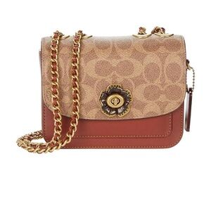 Coach Mini Madison Signature Canvas
Shoulder Bag